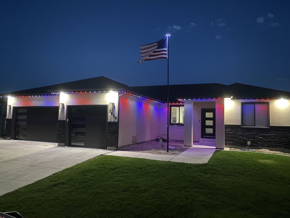Red, white and blue permanent lighting installed by Encompass Lighting