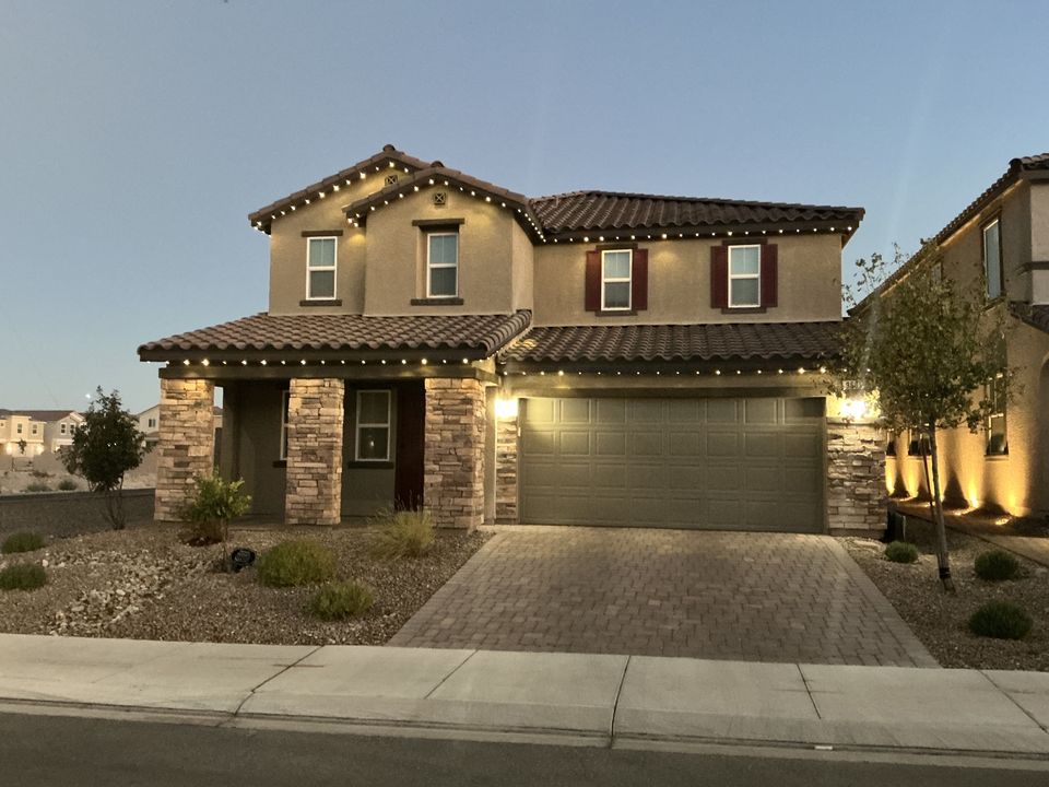 Warm white permanent lighting installed by Encompass Lighting on a Las Vegas home